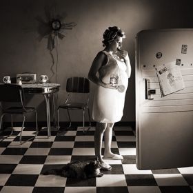 Woman raiding the fridge in the middle of the night Woman raiding the fridge in the middle of the night